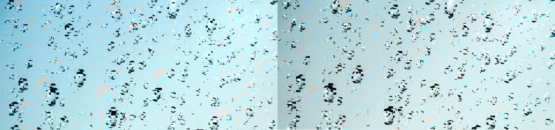 Regndråber på en lyseblå baggrund Regndråber på en lyseblå baggrund