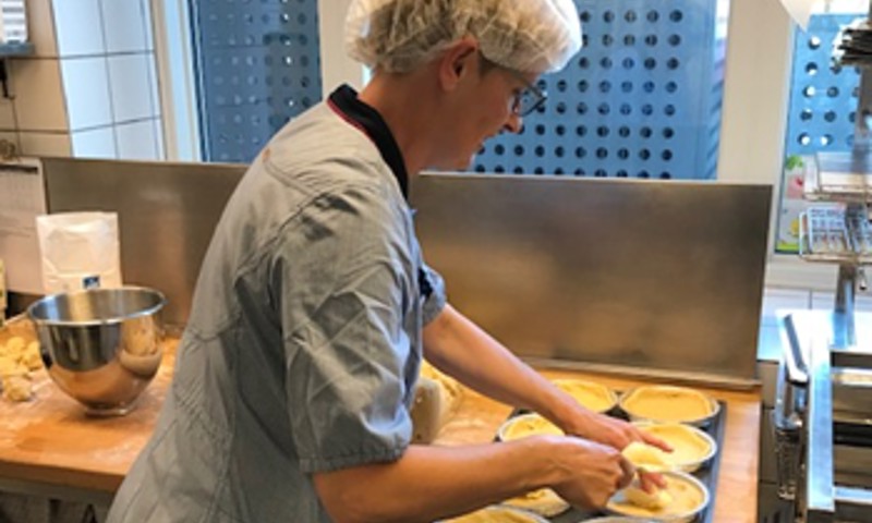 Madlavning i et køkken Madlavning i et køkken