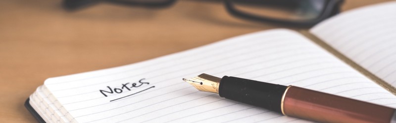 Notesbog og briller