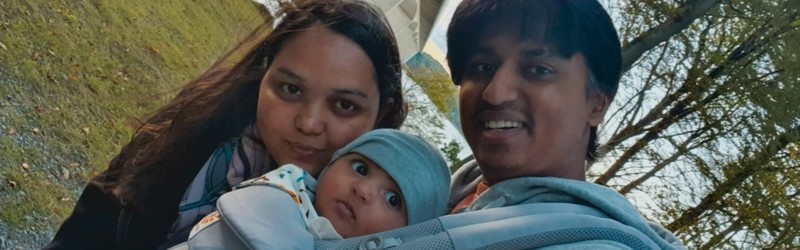 International newcomers smiling at the camera